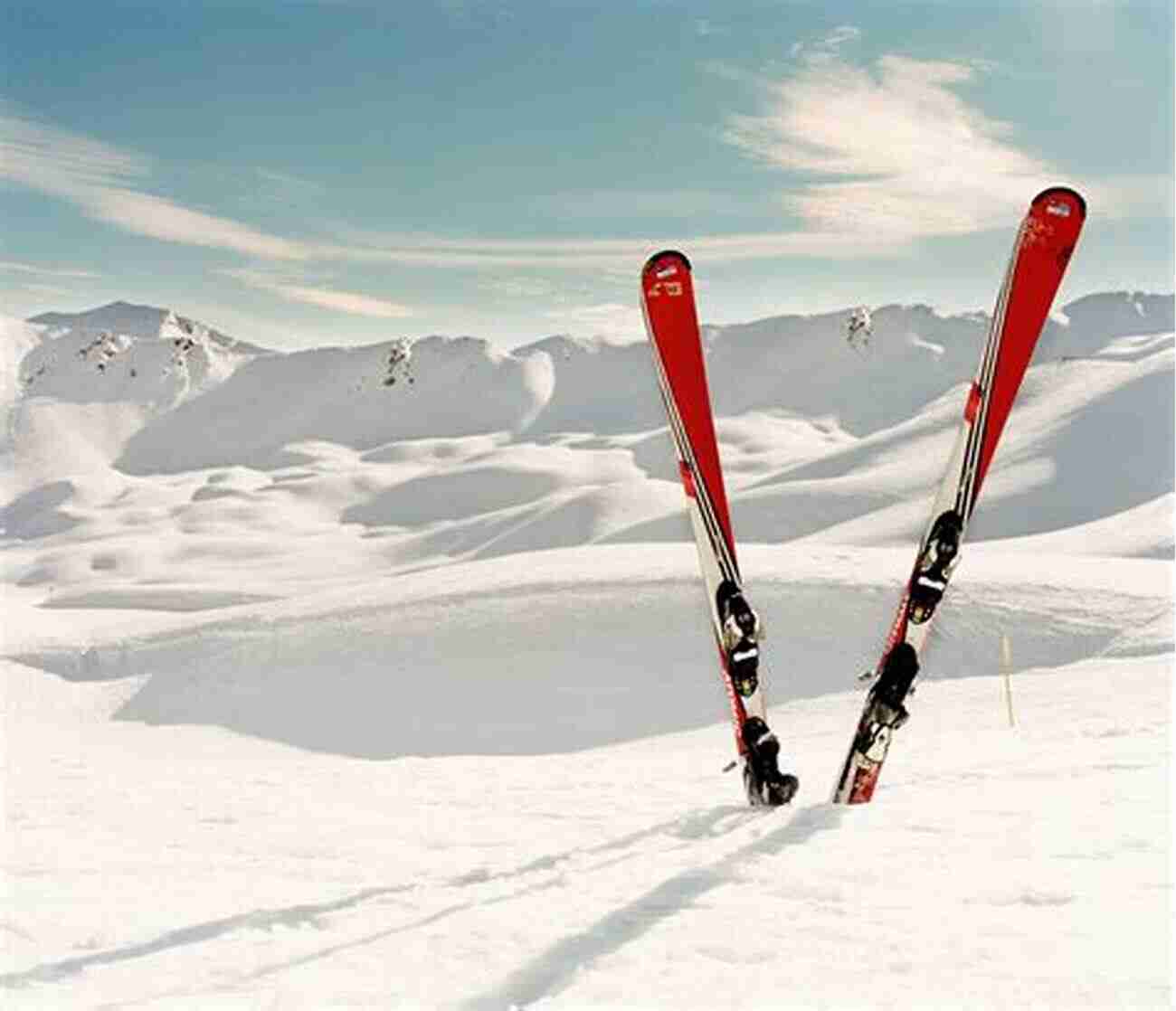 A Pair Of Snowskis SNOWSKIING FOR NOVICE: EASY GUIDE TO SNOWSKIING BASICS STEPS TIPS AND MANY MORE