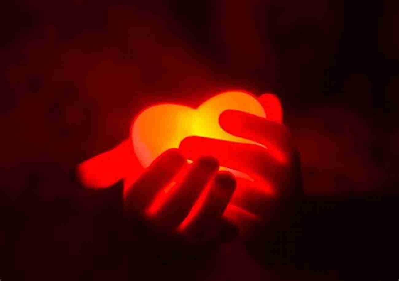 A Person Holding A Glowing Heart, Symbolizing The Power Of Self Love Free The Girl: A Story About (finding) Self Love