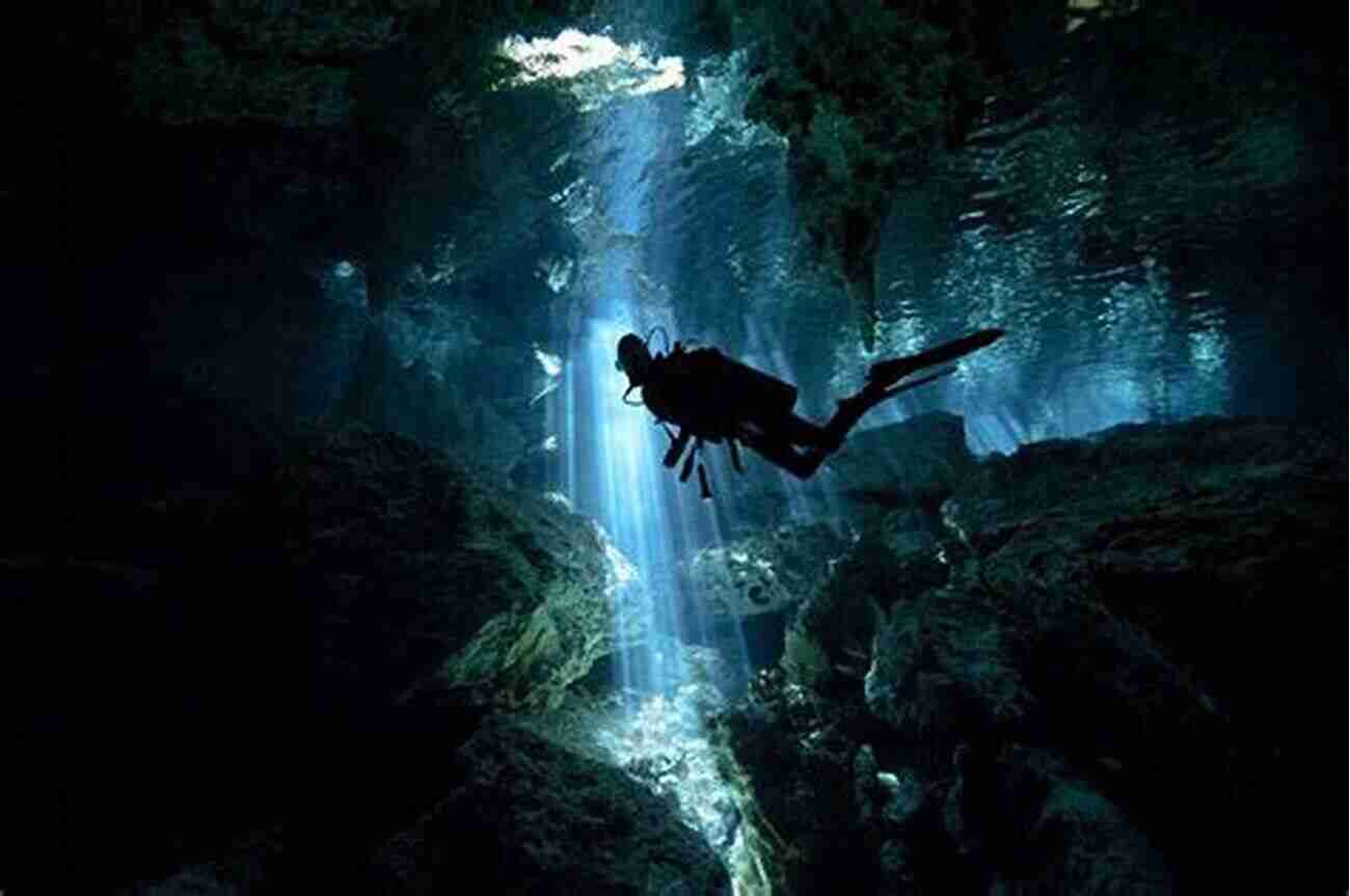 Cave Divers Swimming Through An Underwater Cave. DIAMONDS IN THE ROUGH (Cave Divers 21)