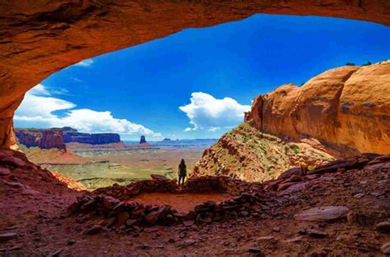 Hiker Sitting Inside The False Kiva Best Easy Day Hikes Canyonlands And Arches National Parks (Best Easy Day Hikes Series)