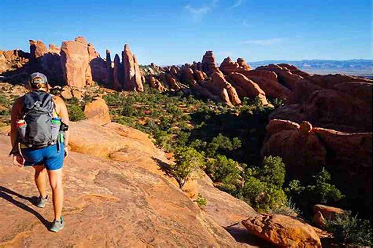 Hikers Navigating Through The Picturesque Devils Garden Loop Best Easy Day Hikes Canyonlands And Arches National Parks (Best Easy Day Hikes Series)