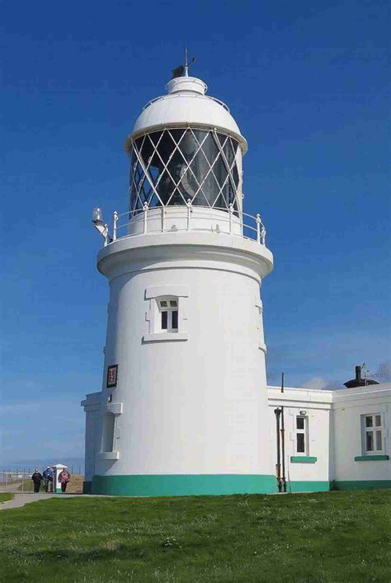 Mesmerizing Lighthouse In Cornwall Standing Tall Against The Powerful Waves Wild Guide: Devon Cornwall And South West (Wild Guides)