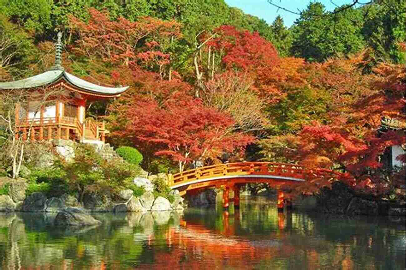 Traditional Japanese Temple Surrounded By Cherry Blossom Trees In Kyoto Wild Beautiful Places: Picture Perfect Journeys Around The Globe