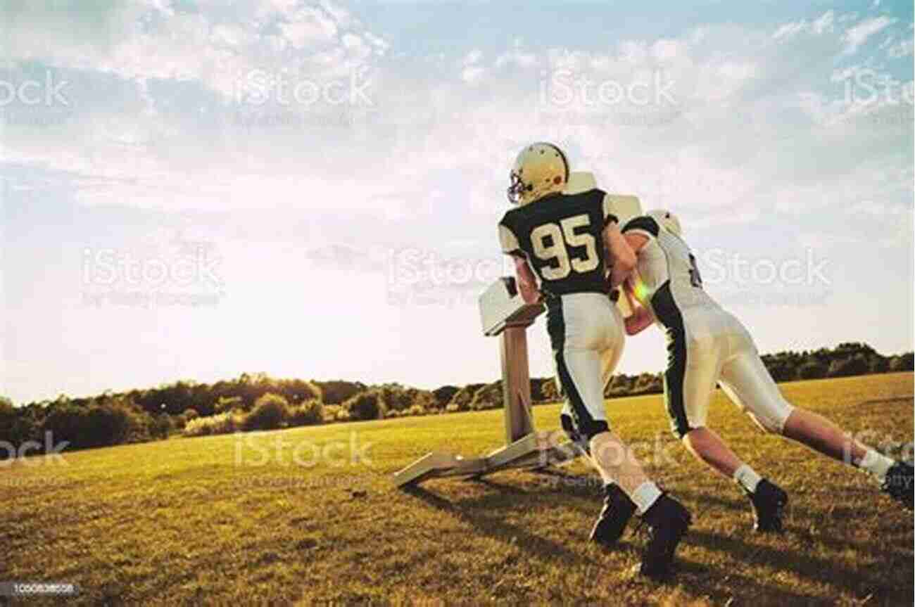 Two Football Players Practicing Angle Tackling During A Drill The Complete Of Football Tackling Drills